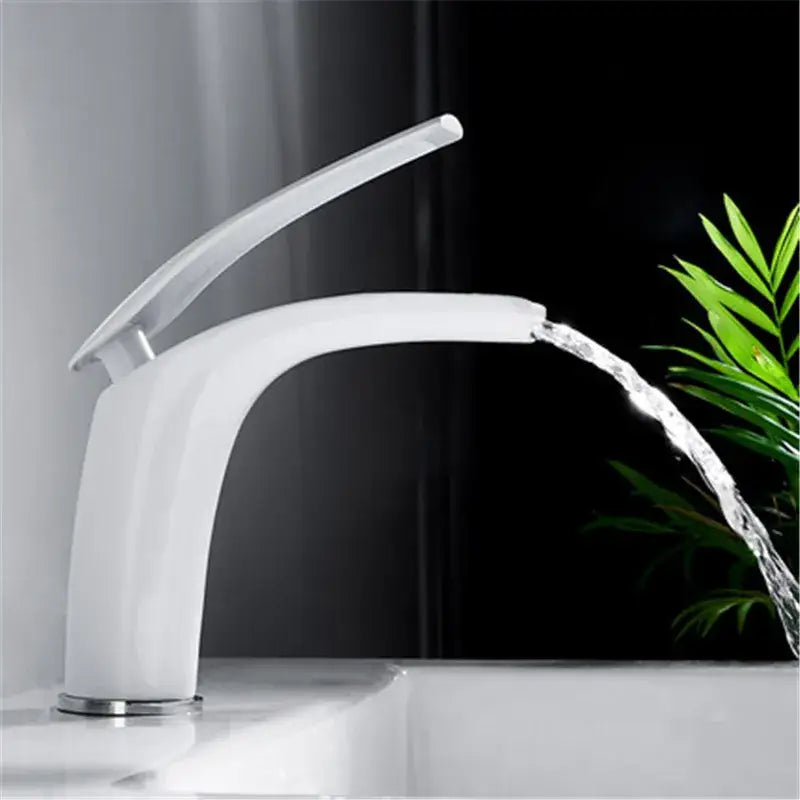 Modern white ceramic faucet with curved design and chrome accents featured with decorbites™ 9l stainless steel gold dustbin