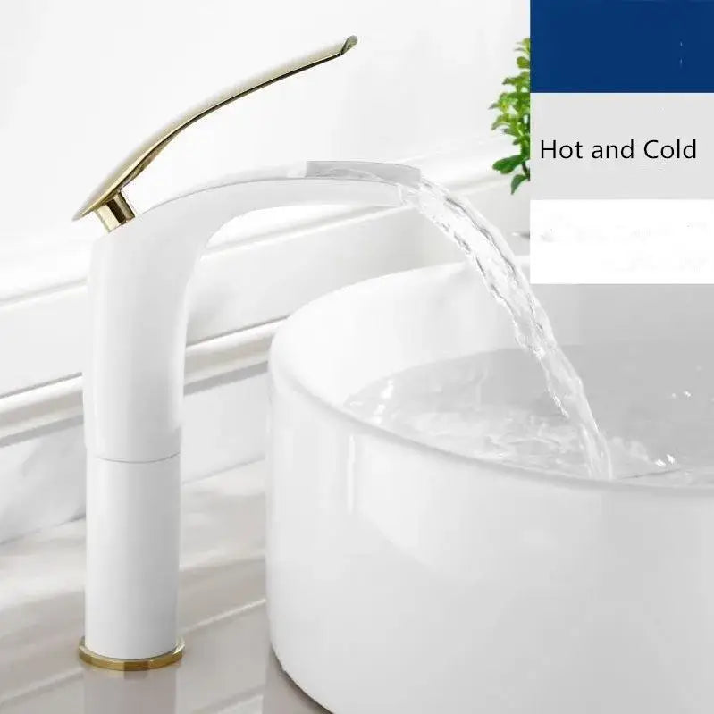 White ceramic faucet with sleek curved design and gold-toned accents beside decorbites stainless steel gold dustbin