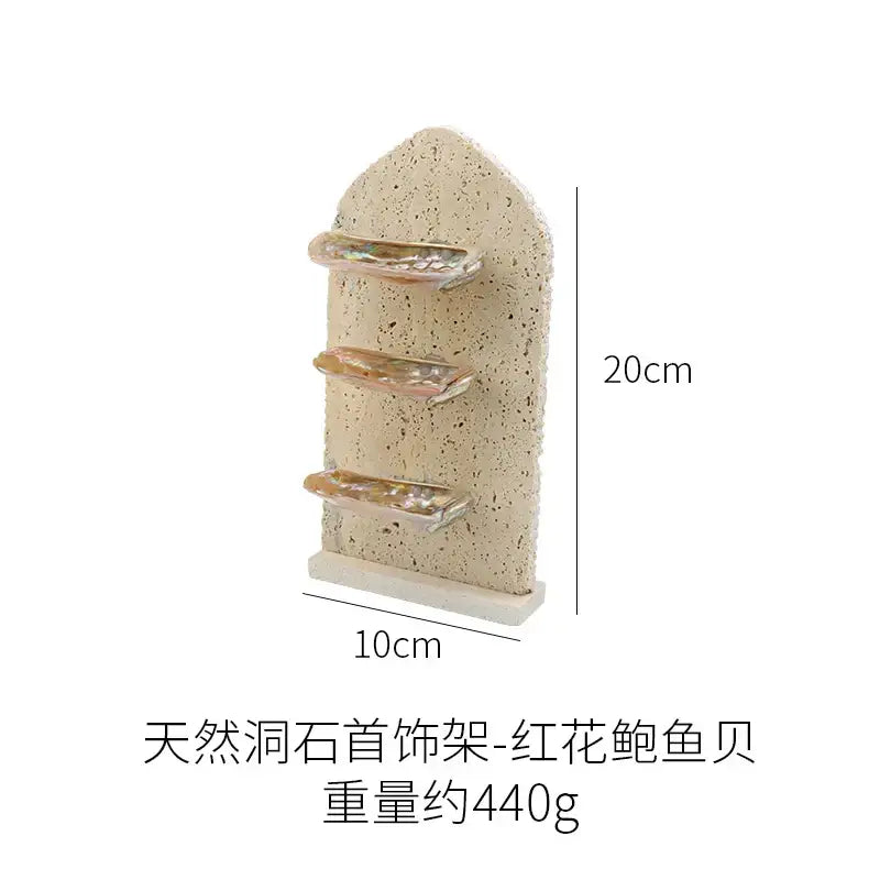 Beige textured stone decorbites abalone shell jewelry organizer with three horizontal iridescent abalone shell tiers