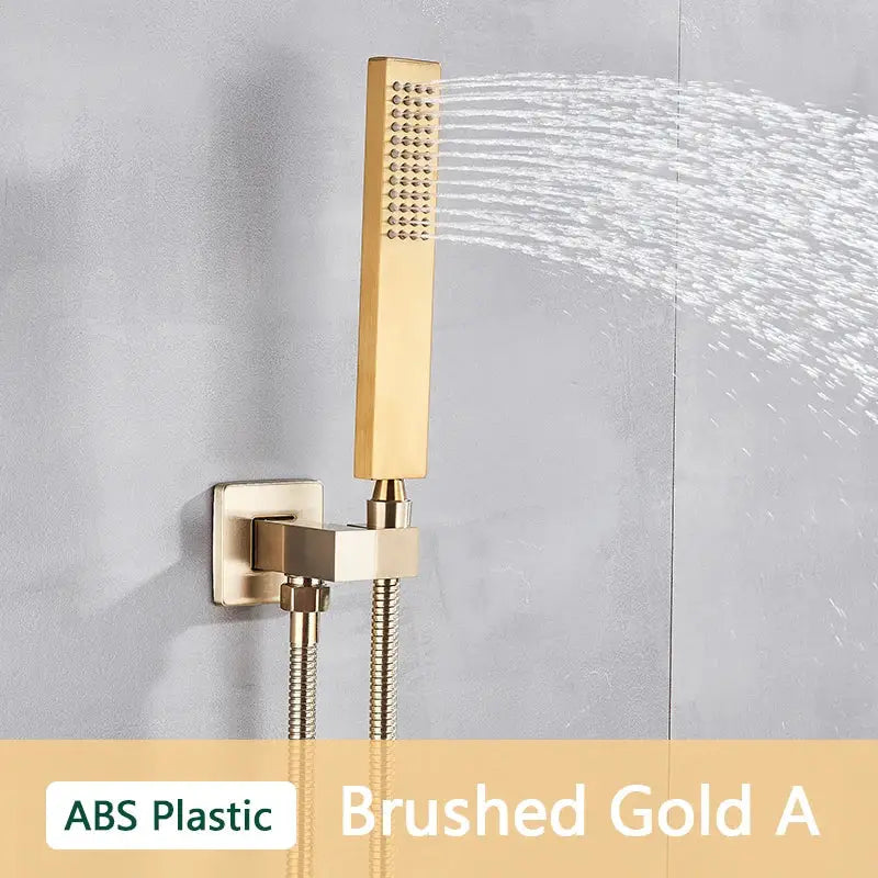 Brushed gold hand shower with rectangular face and perforated spray pattern made of decorbites abs plastic