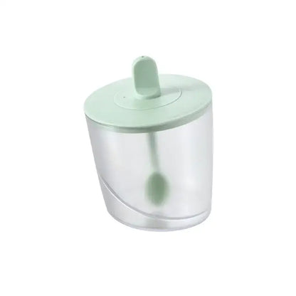 A clear plastic decorbites abs spice jar set with light green lid and spoon designed for sugar salt and pepper