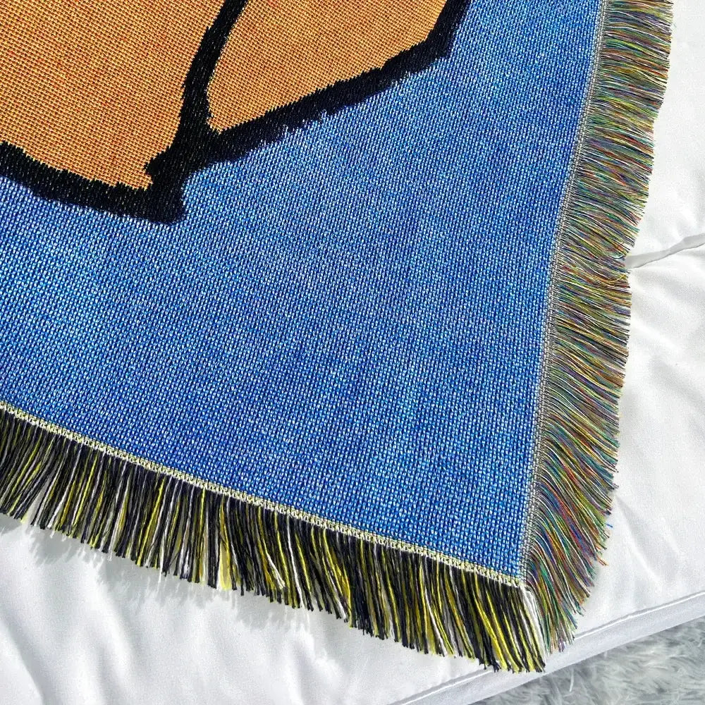 Decorbites abstract aesthetic blue woven blanket with cartoon orange black design and multicolored fringe edges for sofa
