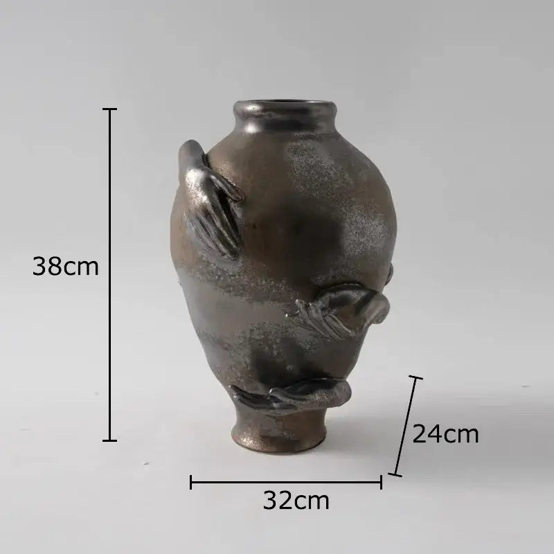 DecorBites abstract art ceramic vase in dark matte finish with sculpted hands for desk decoration and room aesthetic