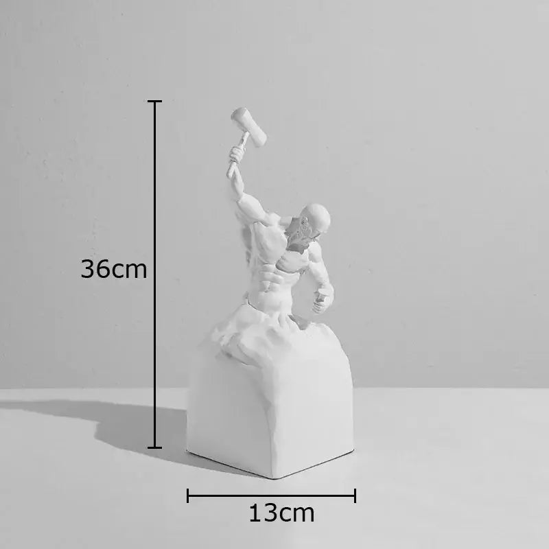White resin character statue of a muscular figure wielding a hammer on a blocky base for abstract artworks desk decor