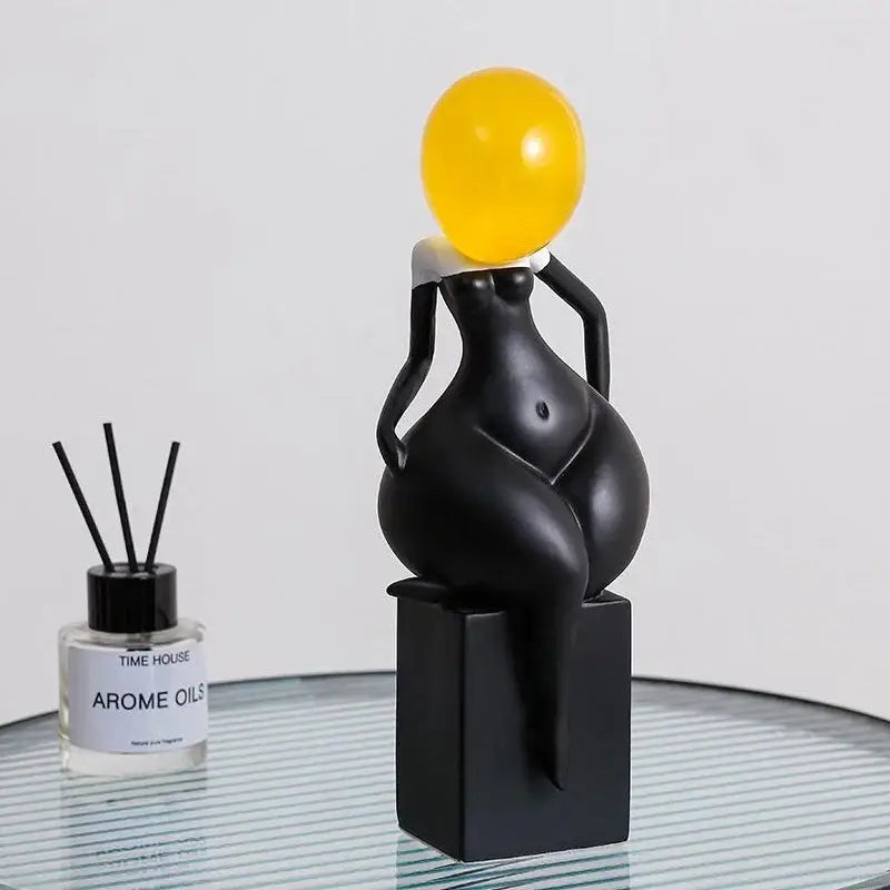 Black resin decorbites abstract art female body figurine with yellow balloon head for modern home decor