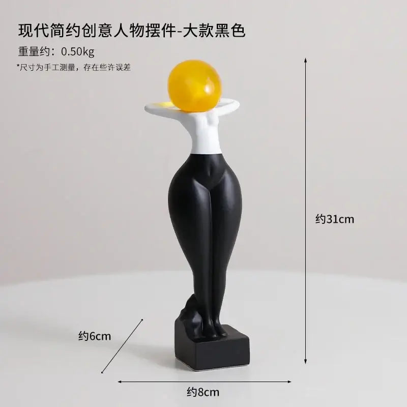 Black and white resin decorbites abstract art female body figurine with glossy yellow sphere standing 31cm tall