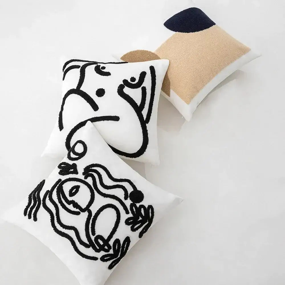 White square cushion cover with black embroidered abstract art line design from decorbites abstract art collection