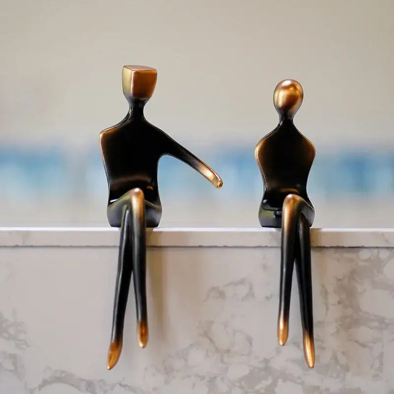 Two minimalist bronze decorbites abstract art resin statues with smooth elongated limbs for abstract art lovers gift