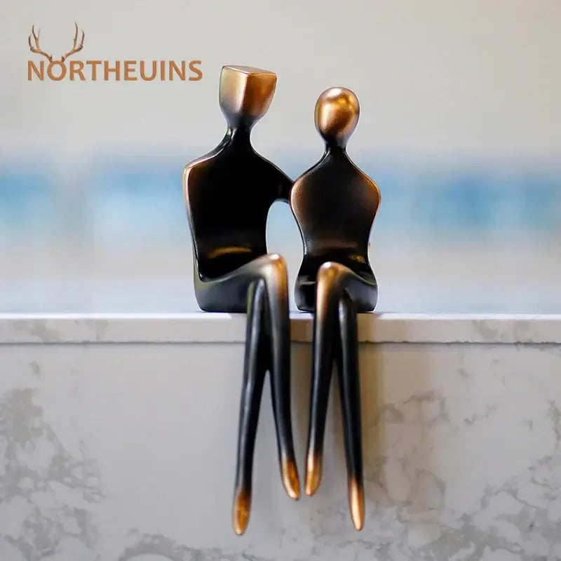Bronze-finished resin decorbites abstract art lover statue featuring sleek minimalist design for Valentine’s anniversary gift