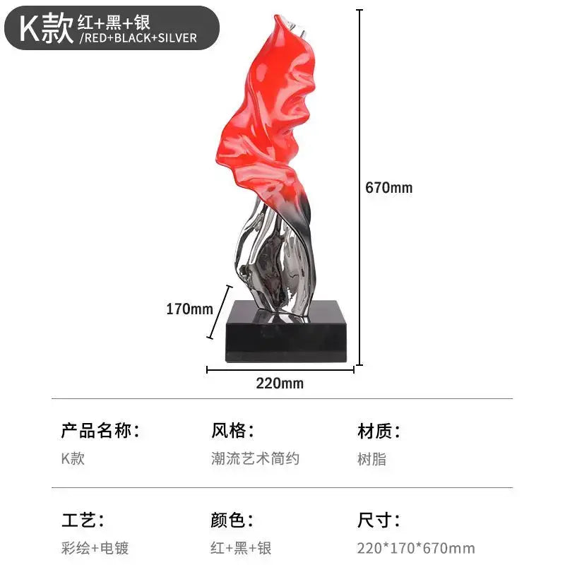 Decorbites abstract art ribbon sculpture with vibrant red top and reflective silver base on black pedestal for living room