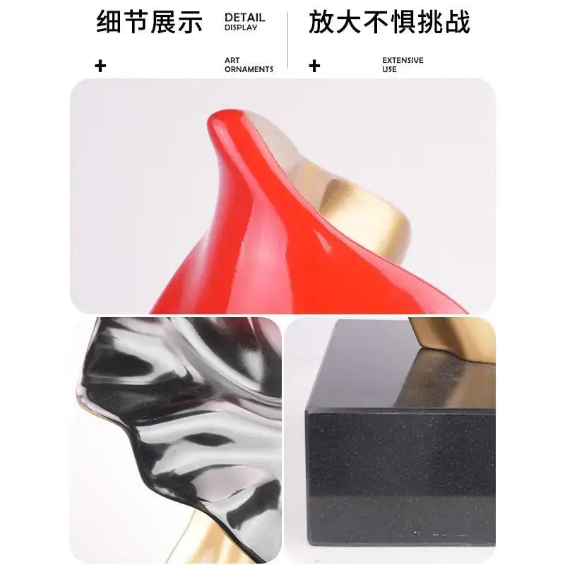 Decorbites abstract art ribbon sculpture in red and gold with glossy finish mounted on black granite base for floor decor