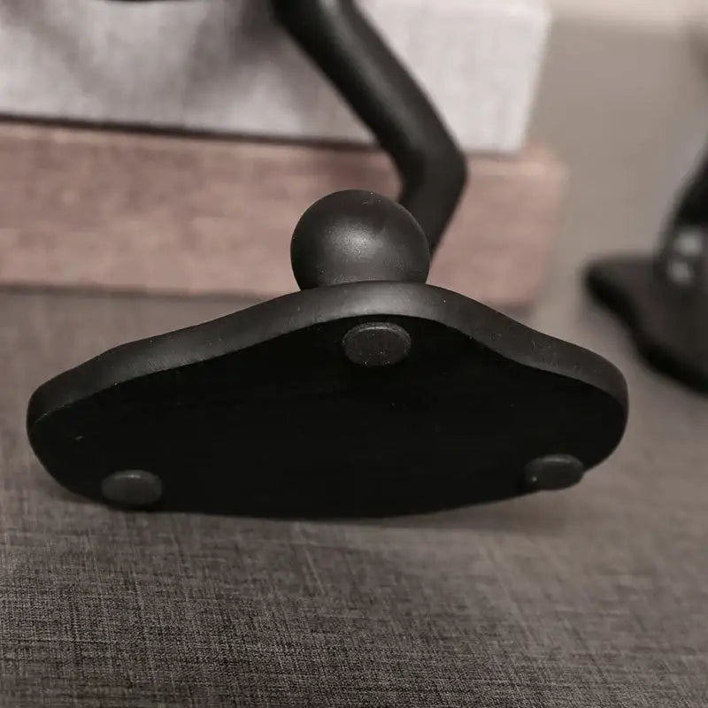 Black matte desk lamp base with rounded spherical top and three circular feet for decorbites abstract athlete sculpture