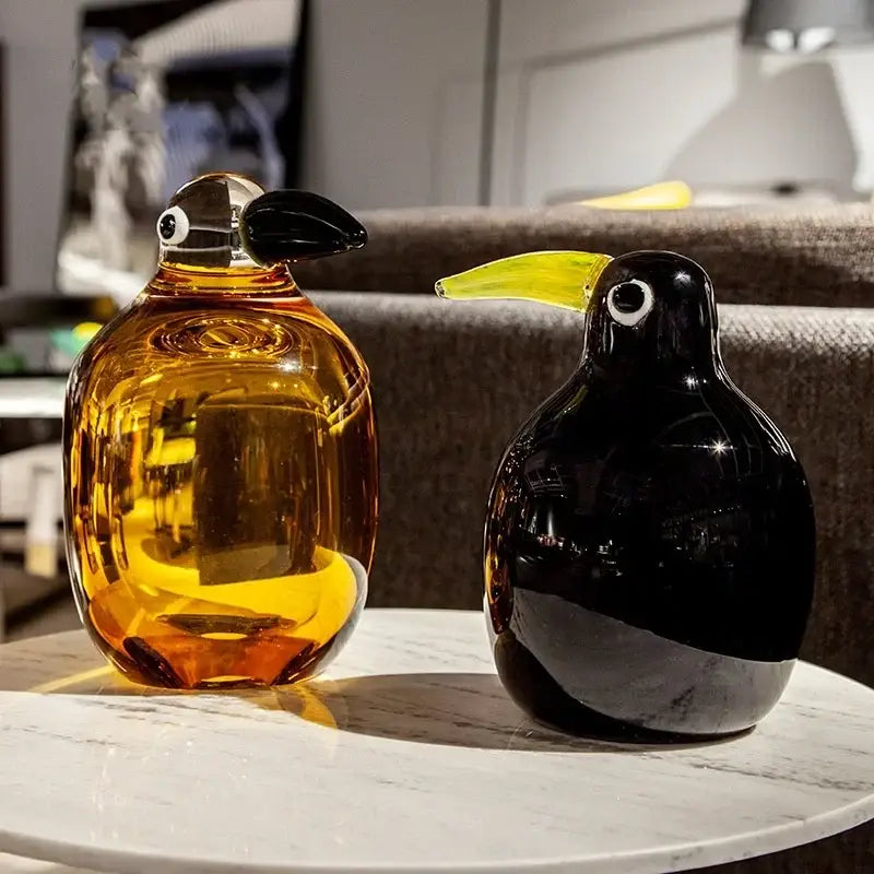 Two glass decorbites abstract bird figurines in amber and black with contrasting beaks for home decor sculpture
