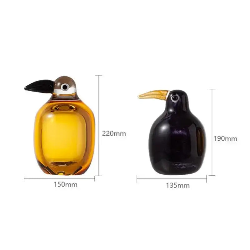 Two hand-blown glass bird figurines in amber and deep purple for home decor by decorbites abstract bird sculpture