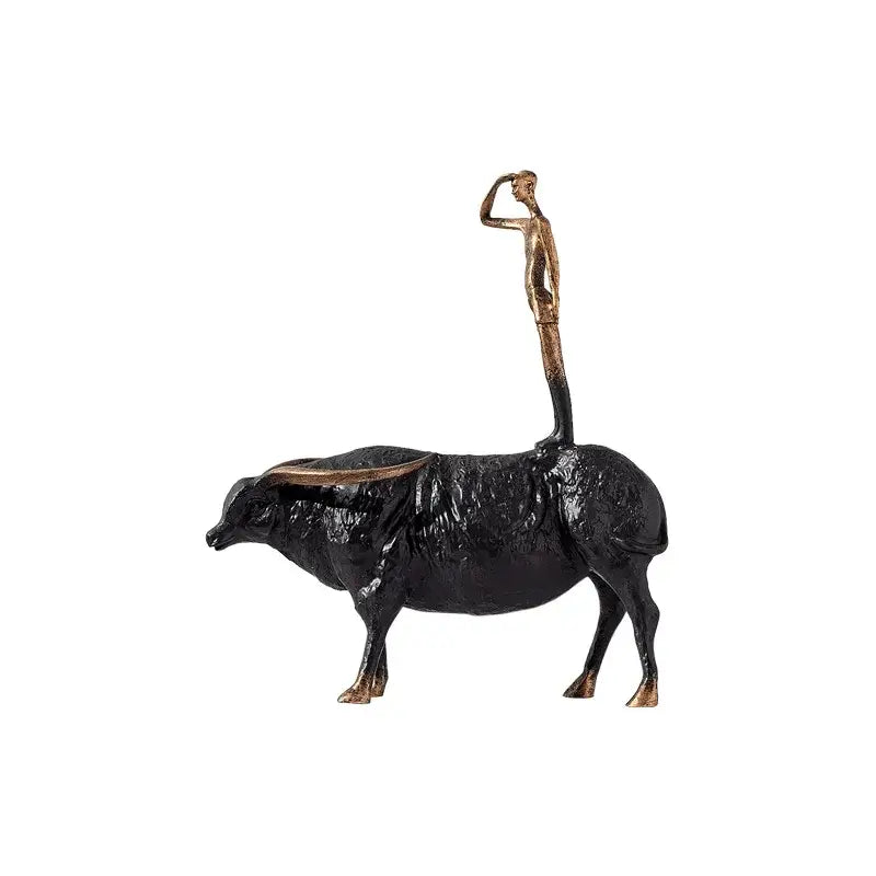 Decorbites abstract black yak golden metal figurine featuring a black and bronze man standing atop a bull sculpture