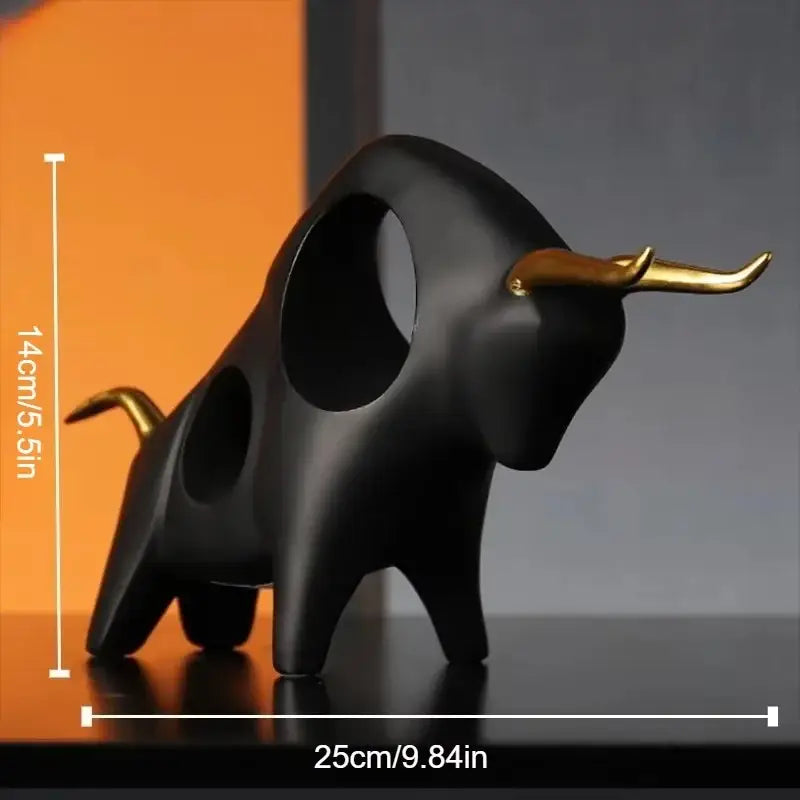 Black and gold abstract bull sculpture with sleek modern design from DecorBites for living room decor