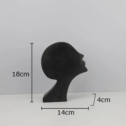 Decorbites abstract cast iron acrobatics sculpture featuring black matte minimalist head and neck figure 18cm tall