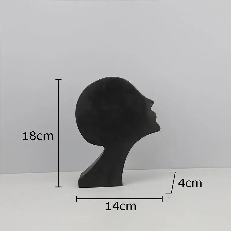 Decorbites abstract cast iron acrobatics sculpture featuring black matte minimalist head and neck figure 18cm tall