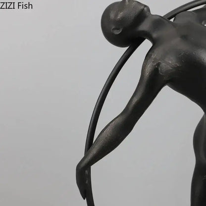 Black metallic decorbites abstract cast iron acrobatics sculpture with smooth contours and elongated limbs for desk decor