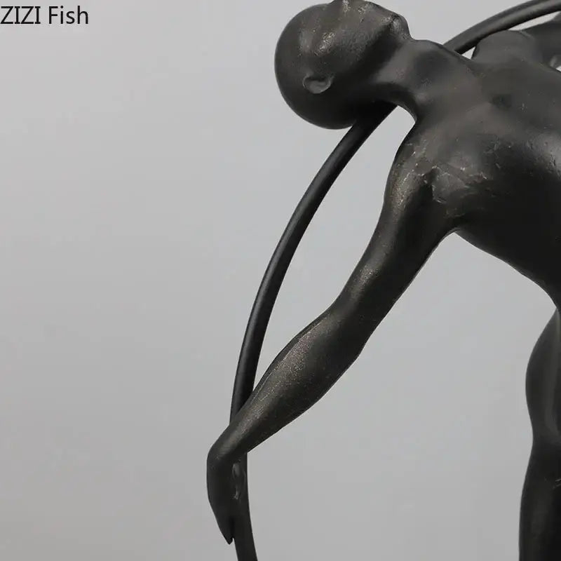 Black metallic decorbites abstract cast iron acrobatics sculpture with smooth contours and elongated limbs for desk decor
