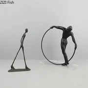 Black metal decorbites abstract cast iron sculpture of a slender figure holding a circular hoop for desk decoration