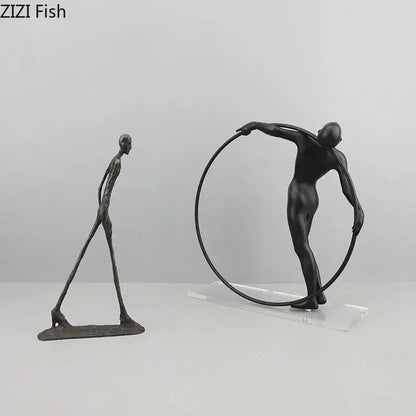 Black metal decorbites abstract cast iron sculpture of a slender figure holding a circular hoop for desk decoration