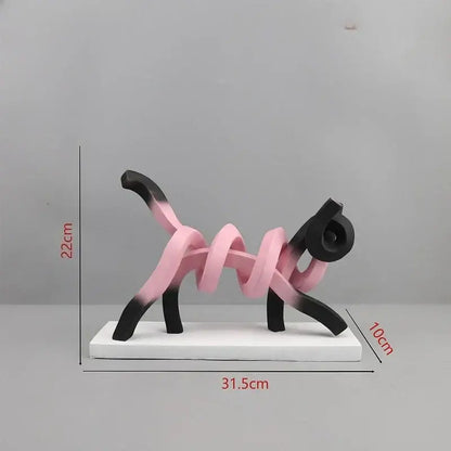 A sleek decorbites abstract cat sculpture with pink and black gradient resin finish for children’s room decor