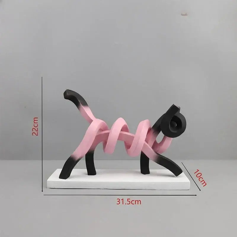 A sleek decorbites abstract cat sculpture with pink and black gradient resin finish for children’s room decor