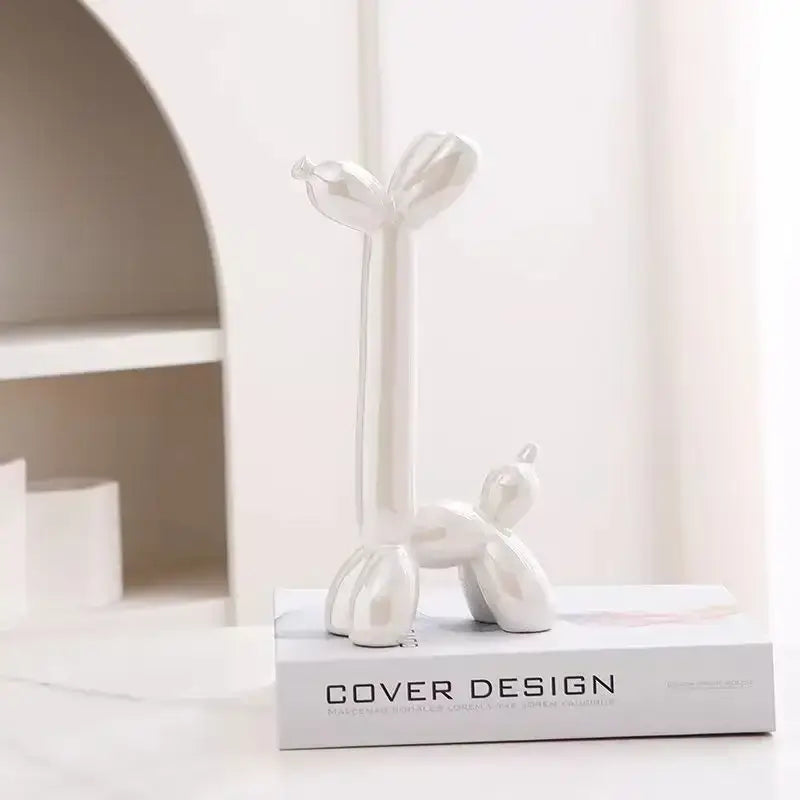 White ceramic balloon dog figurine with glossy finish and sleek design by decorbites abstract ceramic for home decor