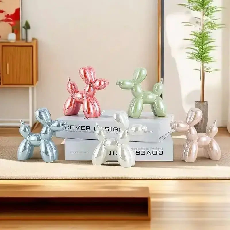 Shiny metallic balloon dog figurines in pink mint green silver and light rose gold decorbites abstract ceramic balloon sculpture