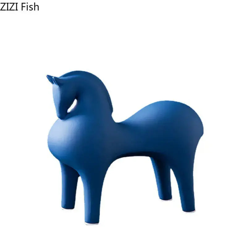 A sleek matte blue abstract ceramic horse decorative figurine by DecorBites with minimalist design and smooth contours