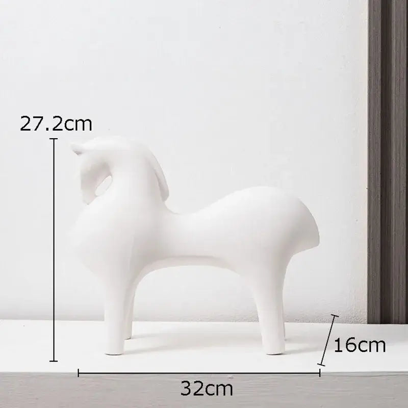 A sleek white abstract ceramic horse decorative figurine by decorbites with smooth curves and modern minimalist design