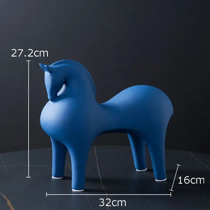 DecorBites abstract ceramic horse decorative figurine in sleek matte blue with white-painted feet and minimalist design