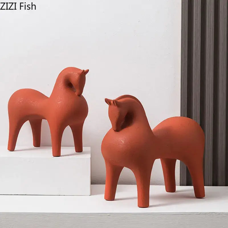 Two terracotta abstract ceramic horse decorative figurines by DecorBites with a smooth minimalist design