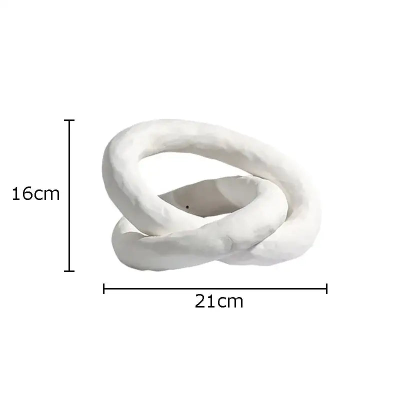 Decorbites abstract ceramic knot sculpture in white matte finish with smooth intertwined loops for room aesthetic decor
