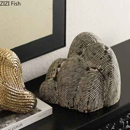 Black and white striped decorbites abstract ceramic sculpture ornament with textured wave-like design for desk decoration