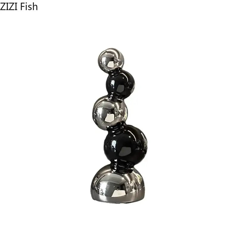 Decorbites abstract ceramic sculpture ornaments featuring sleek black and silver glossy spheres for modern desk decor