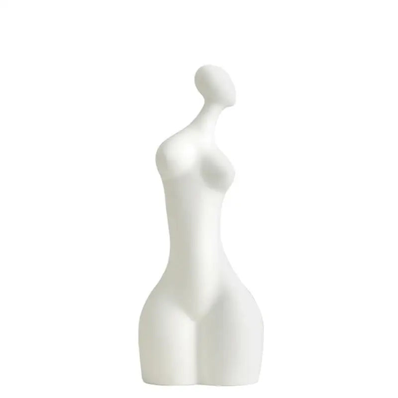 White ceramic sculpture of a stylized female figure with smooth contours from decorbites abstract ceramic sexy collection