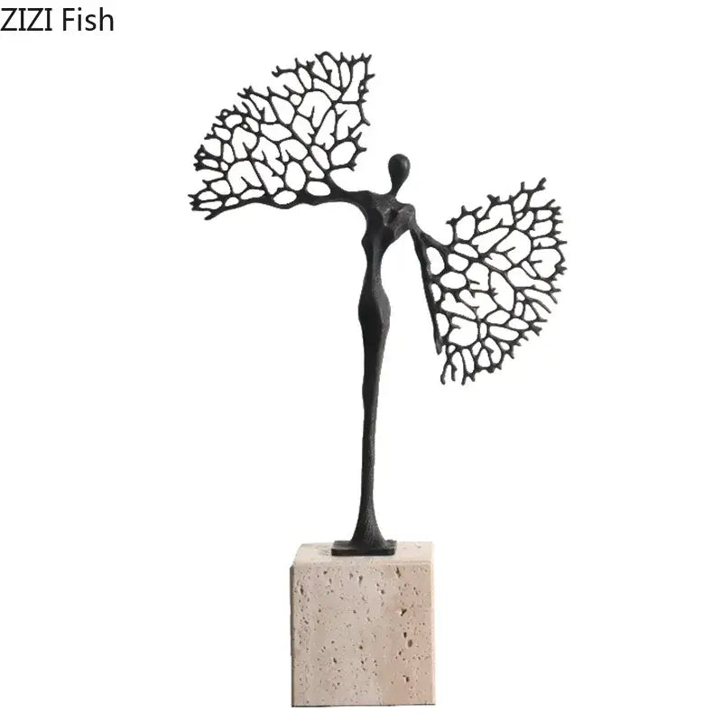 Black metal decorbites™ abstract character marble sculpture with intricate coral-like wings on beige stone base for room decor