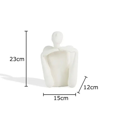 Minimalist white ceramic decorbites abstract character resin sculpture of seated figure with arms crossed for desk decoration