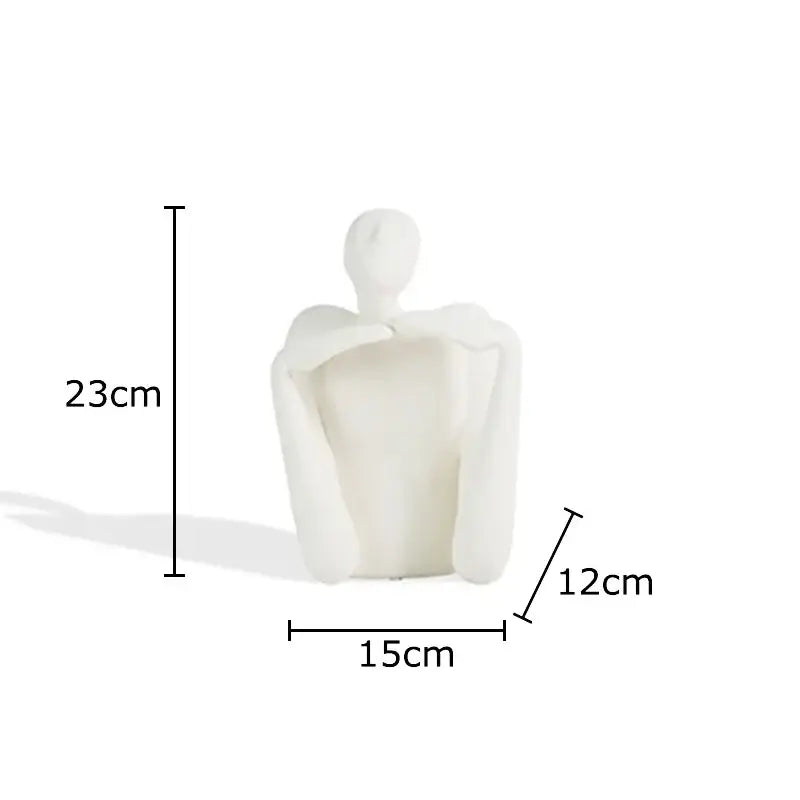 Minimalist white ceramic decorbites abstract character resin sculpture of seated figure with arms crossed for desk decoration