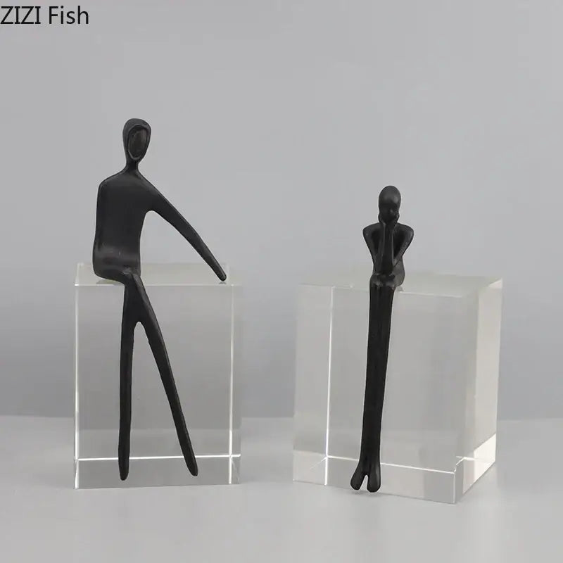 Black decorbites abstract character sculpture with minimalist forms on crystal base for modern room decor
