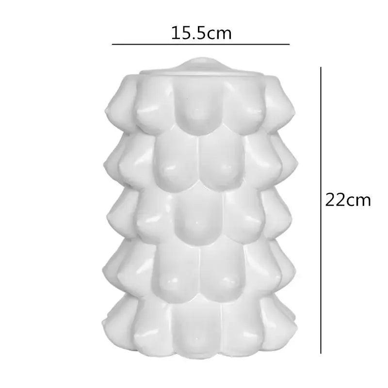 A decorbites abstract character white ceramics vase with glossy finish and tiered scalloped design for modern decor