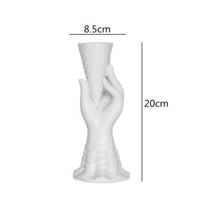 White ceramic vase shaped like a hand holding an ice cream cone decorbites abstract character white ceramics home decor