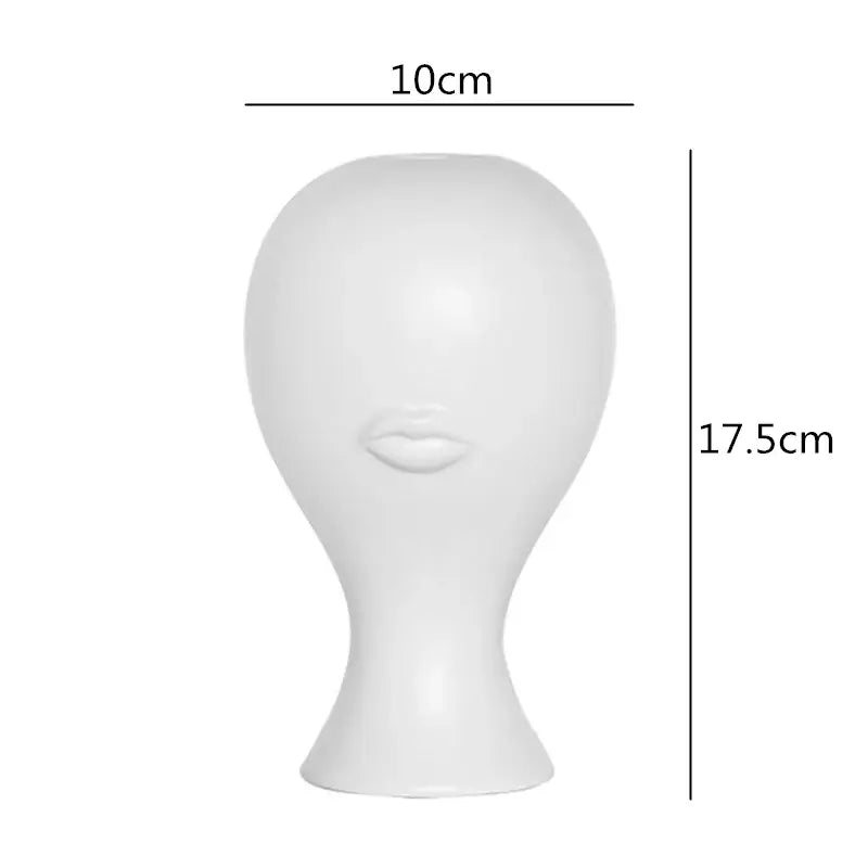 Decorbites abstract character white ceramics vase featuring a smooth glossy finish and minimalist design for home decor