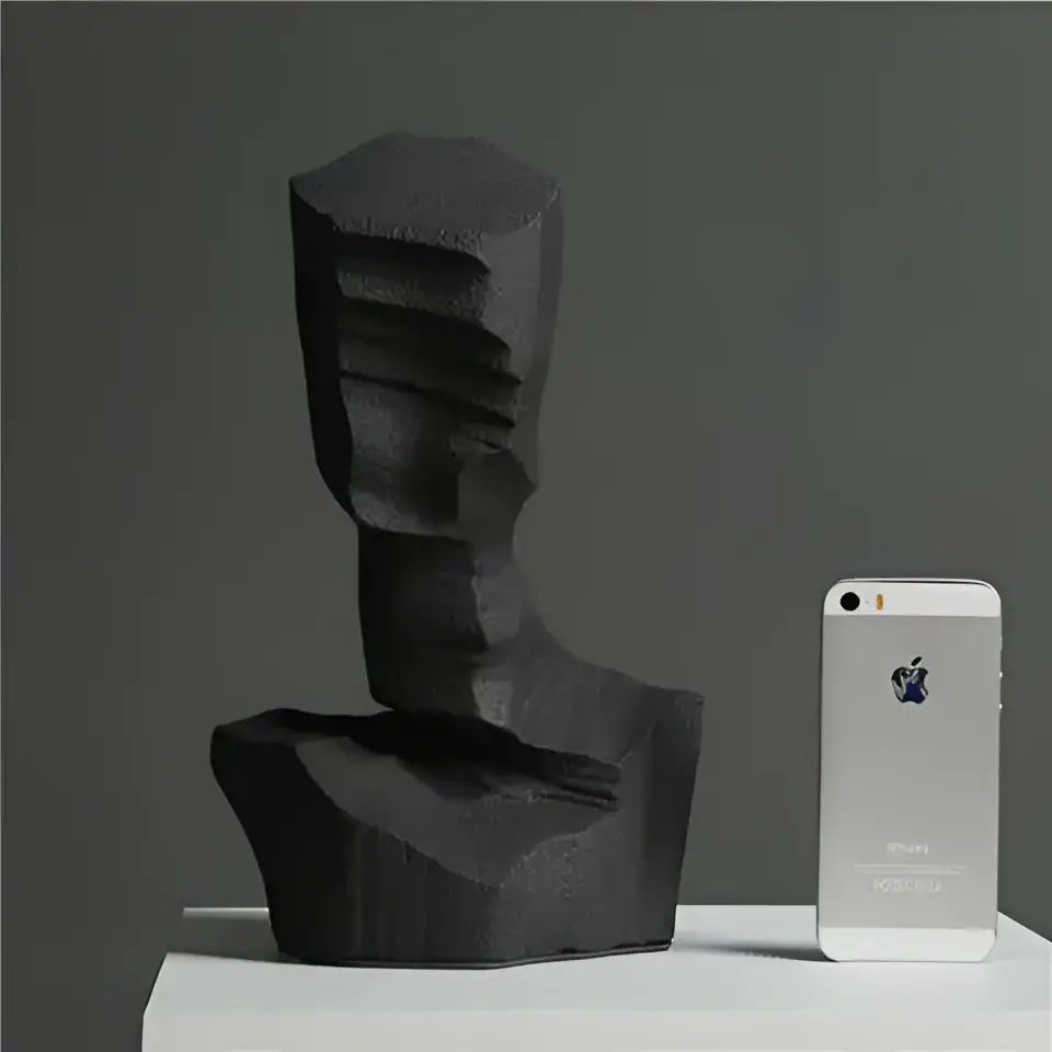 Black textured abstract characters sculpture bust with angular layered design from decorbites for modern decor