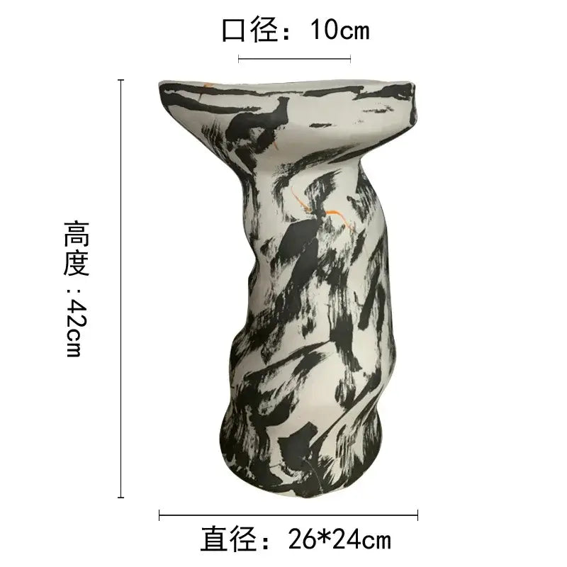 Decorbites abstract clay pot ceramic vase with a tall irregular shape and black and white textured brushstroke pattern
