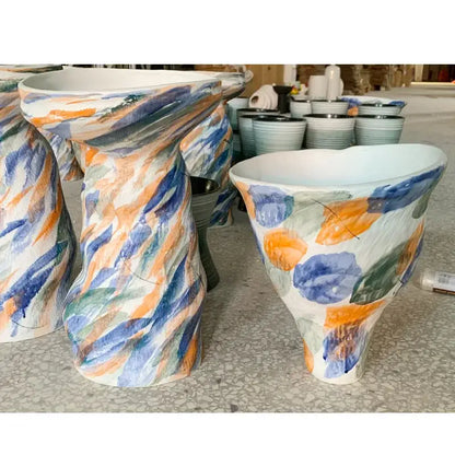 DecorBites abstract clay colorful ceramic pot with bold blue orange and green brushstrokes on white base for home decor