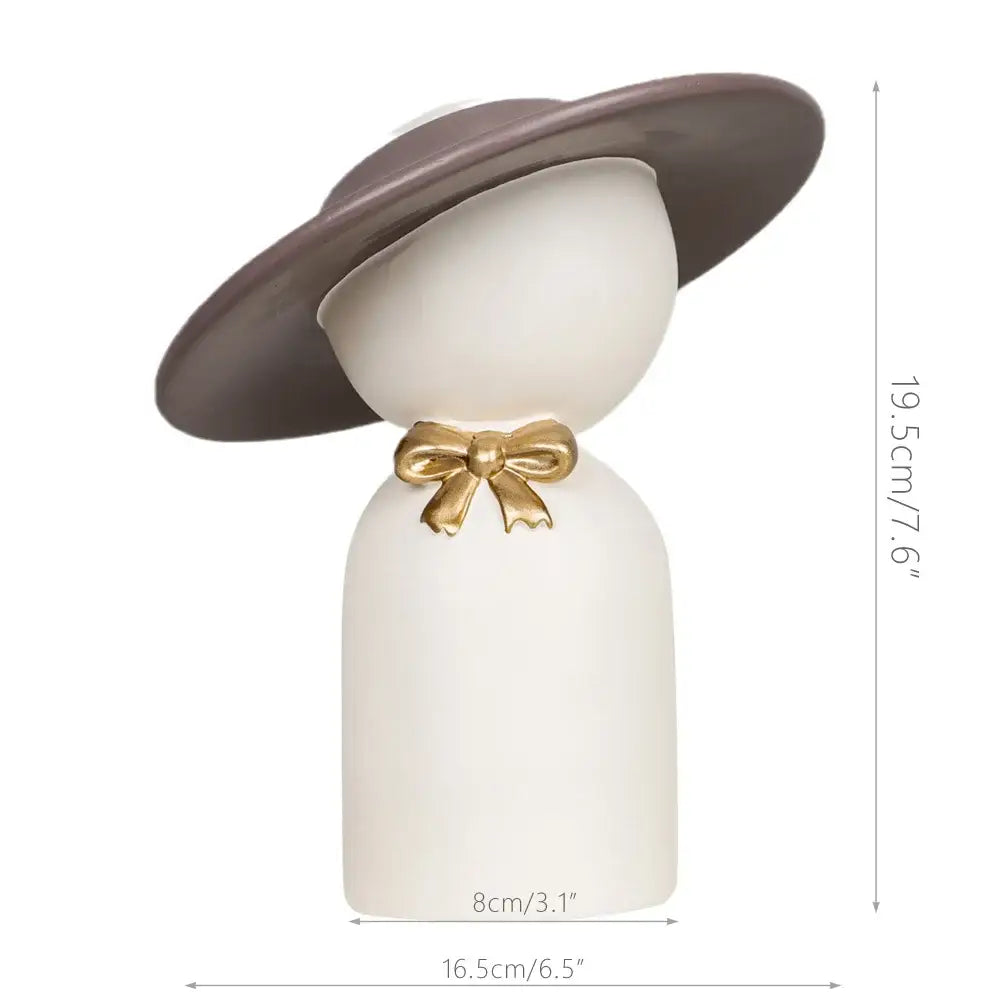 Decorbites abstract couple white ceramic bust sculpture with wide-brimmed brown hat and gold bow for stylish home decor