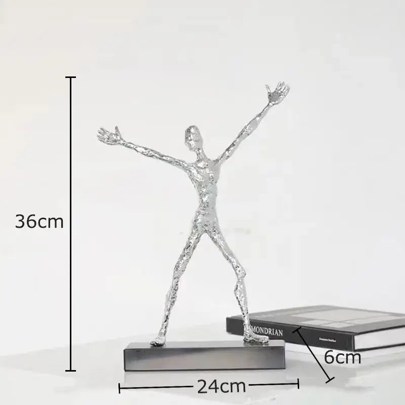 Silver metallic decorbites abstract couple statue with outstretched limbs on rectangular base for desk decoration